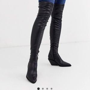Black leather thigh high boots